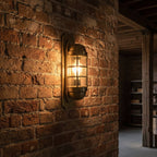 Industrial Antique Brass Bulkhead Wall Sconce - Ribbed Glass Cage Wall Light for Indoor/Outdoor - Cyran Lamps